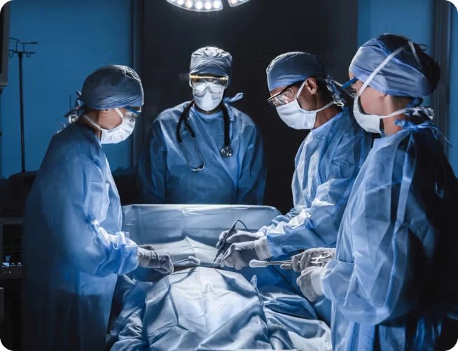 surgeon and medics performing surgery
