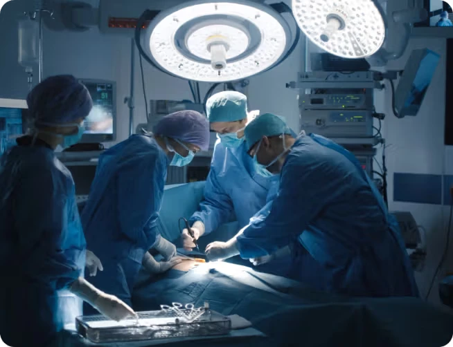 masked surgeons and medics performing surgery