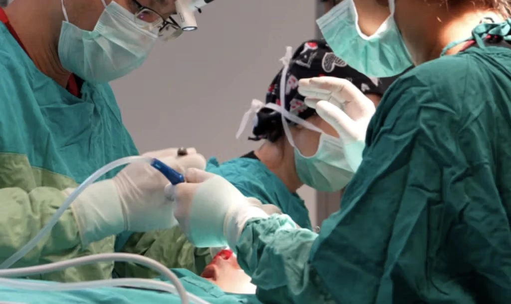 Surgeons operating